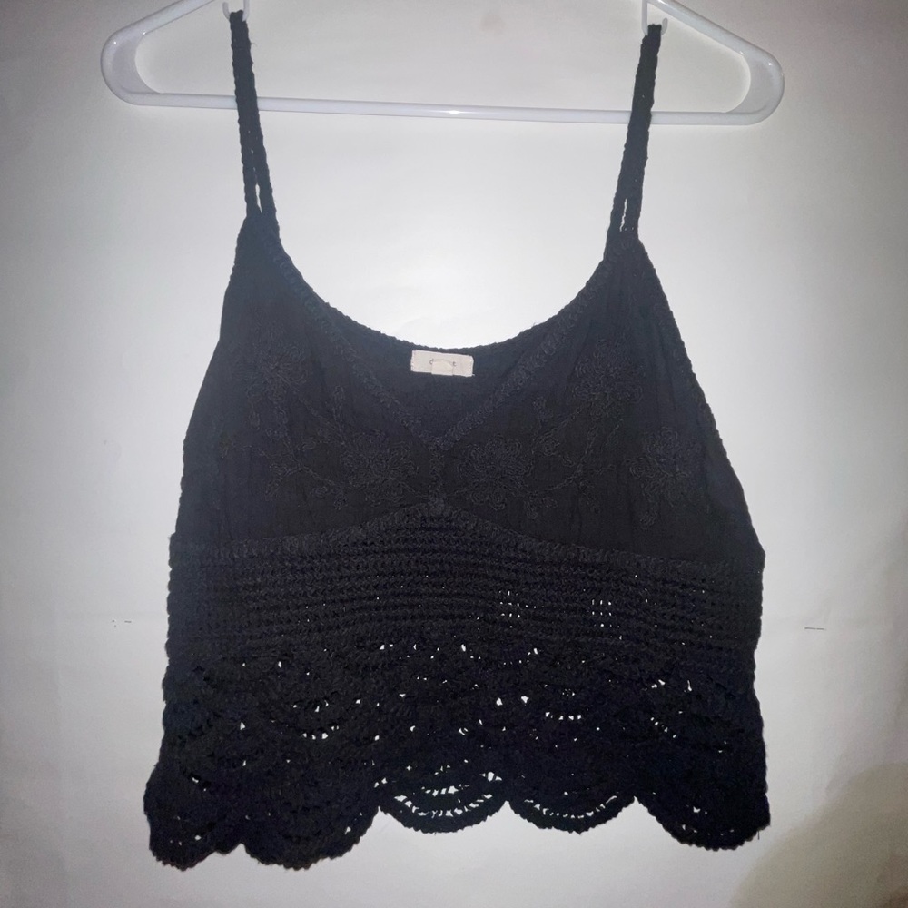 This is a floral lace crop with a v-neck.